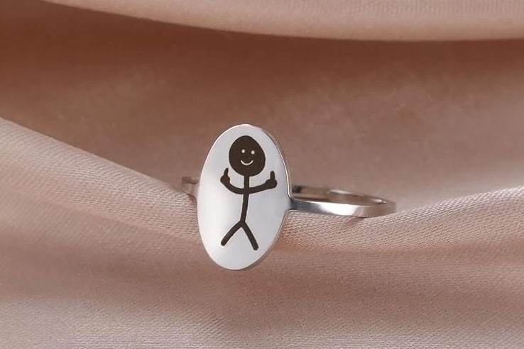Bague argent motif figurine stickman doigt d'honneur